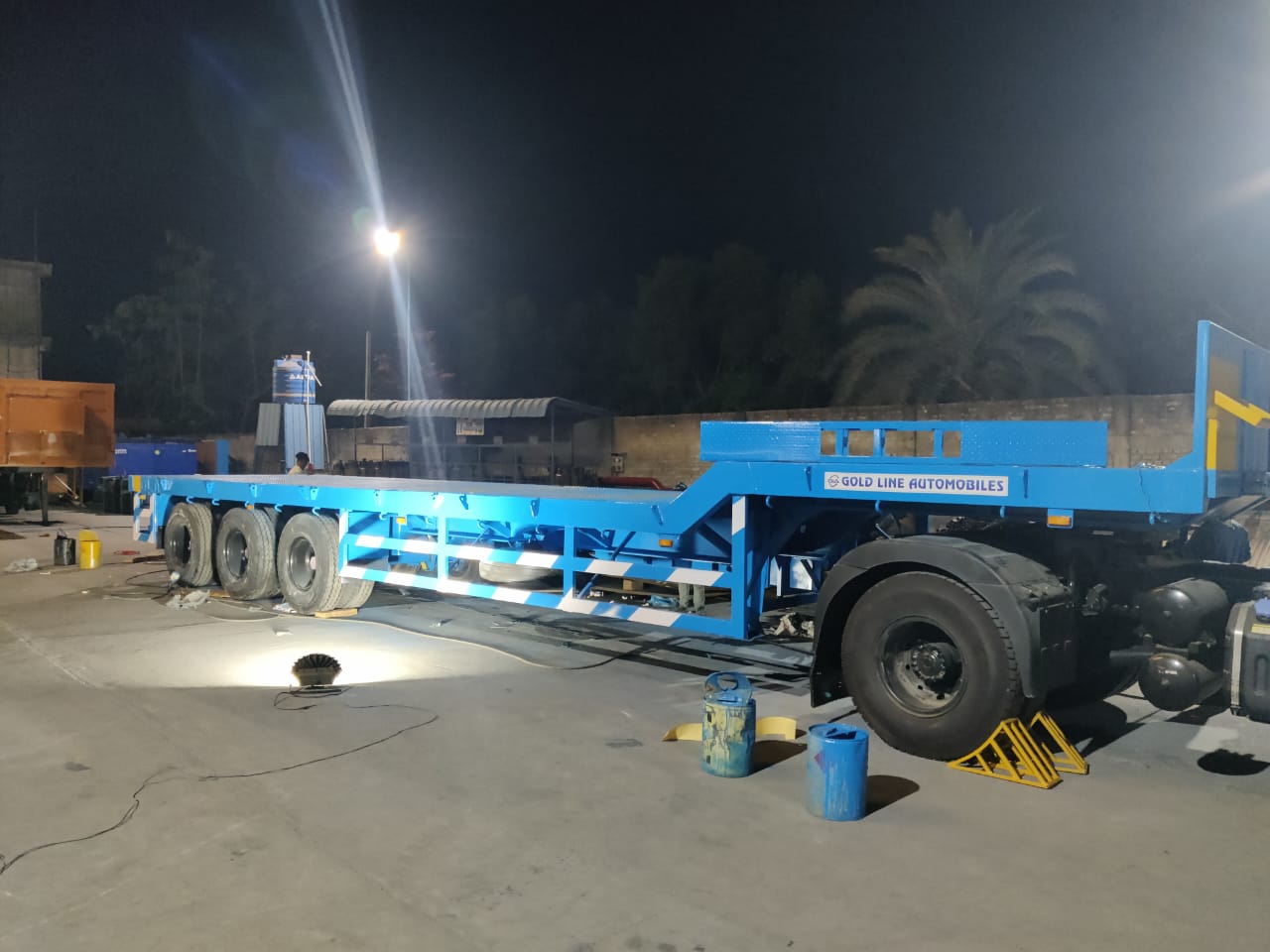 GoldLine Blue Semi-Lowbed Trailer at night